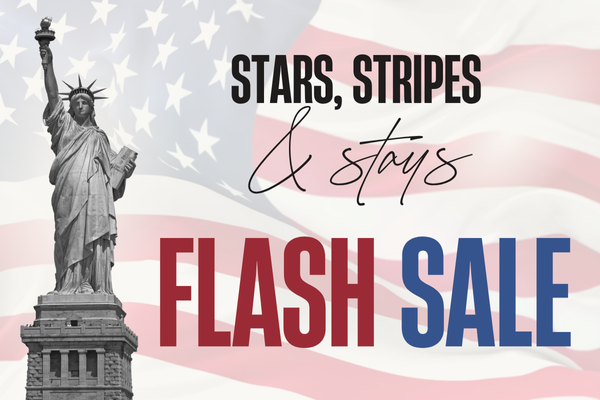 Statue of Liberty on left, American flag background, text reads "Stars, Stripes & Stays FLASH SALE" in bold letters on the right.
